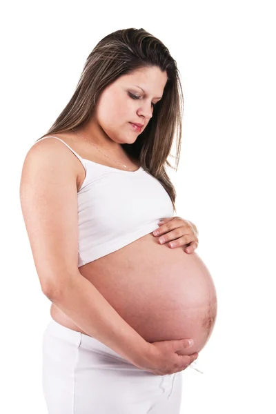 Hamile bir kadının karnı holding beyaz — Stok fotoğraf
