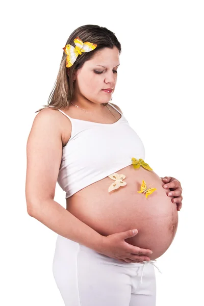 Vrij zwangere vrouw met vlinders — Stockfoto