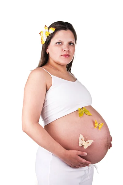 Pretty pregnant woman with butterflies — Stock Photo, Image
