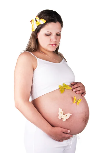Pretty pregnant woman with butterflies — Stock Photo, Image