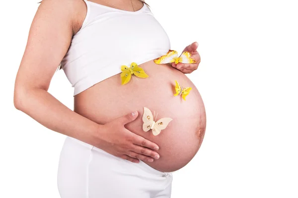Mujer bastante embarazada con mariposas — Foto de Stock