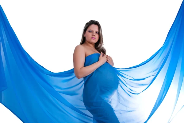 Mulher jovem grávida em tecido — Fotografia de Stock
