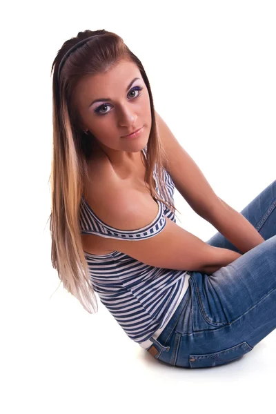 Jonge vrouw in studio Stockfoto