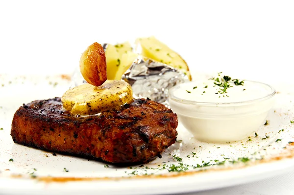 stock image Jucy steak with garlic butter