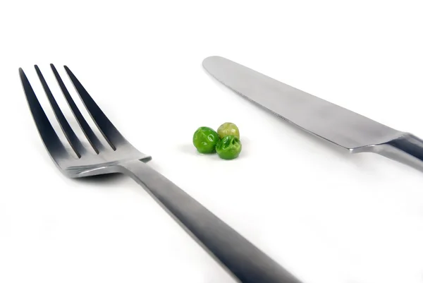 stock image Really small meal of three peas