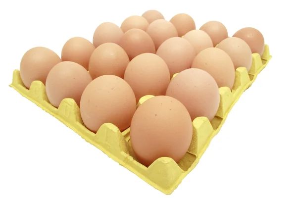 노란색 eggtray에 계란 — 스톡 사진
