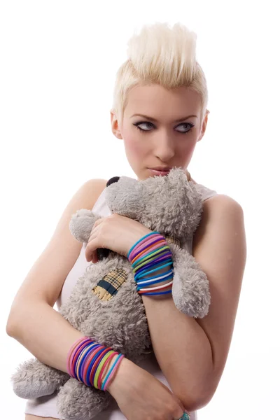 Mooi meisje met blonde haren en teddy — Stockfoto