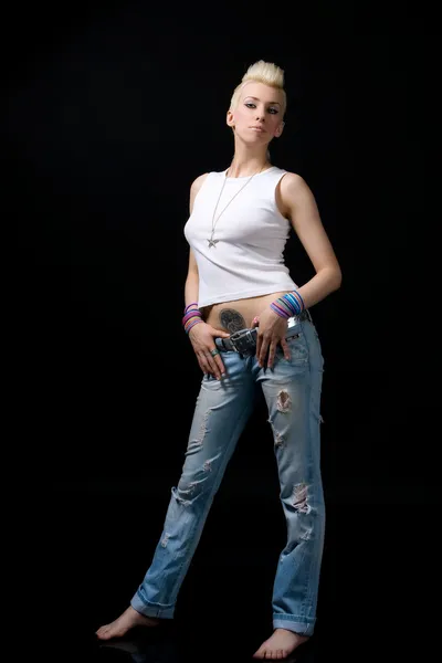 Linda menina loira em jeans — Fotografia de Stock