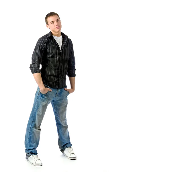 Der junge Mann posiert im Studio — Stockfoto
