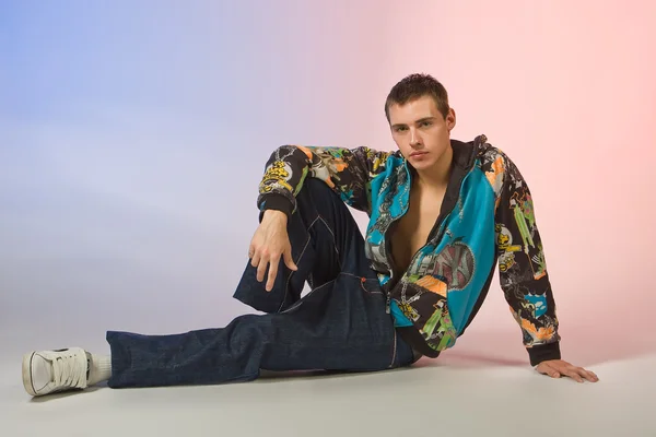 The young man posing in studio — Stock Photo, Image