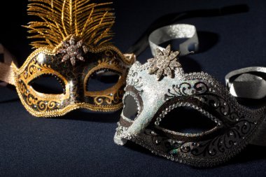 Silver and black carnival masks clipart