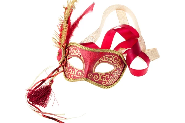 Červené a zlaté pernaté karnevalovou masku — Stock fotografie