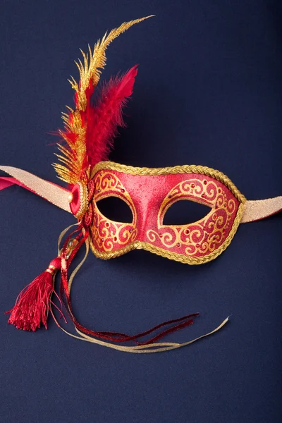 Red and gold feathered mask — Stock Photo, Image