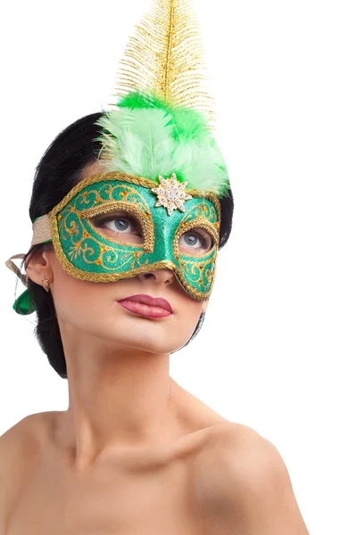 Žena na sobě zelené karnevalovou masku — Stock fotografie
