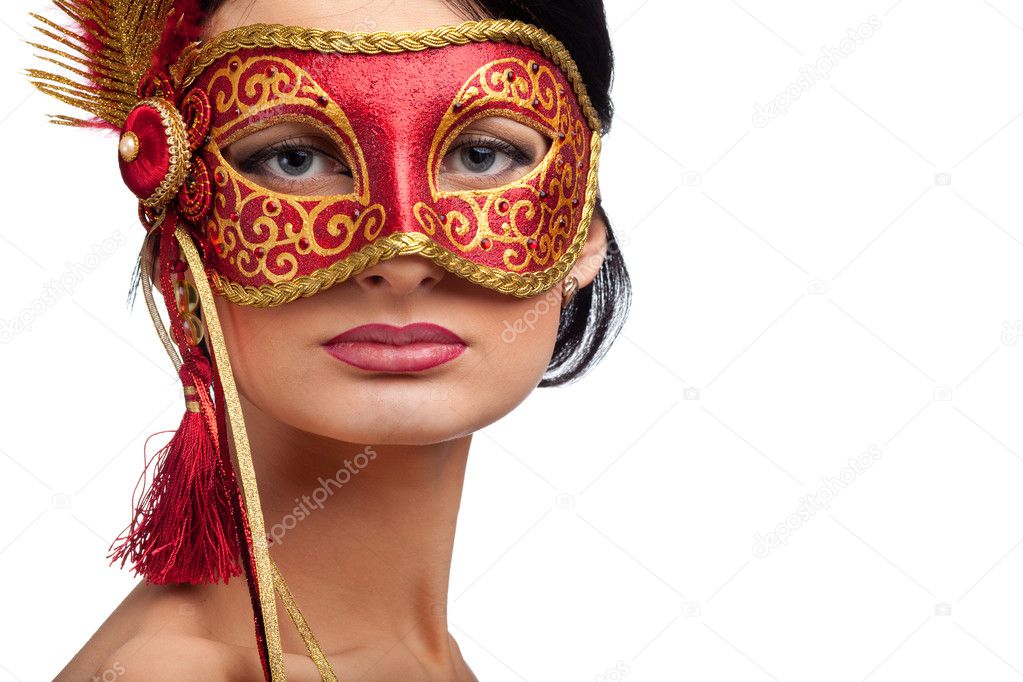Woman wearing red carnival mask
