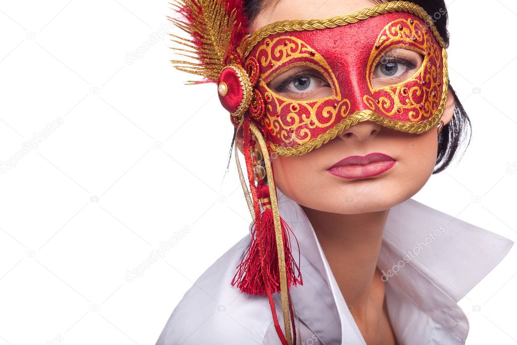 Young woman wearing red carnival mask