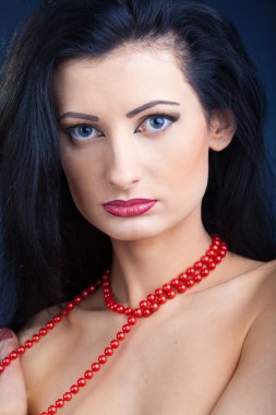 Elegant beautiful woman wearing jewelry.