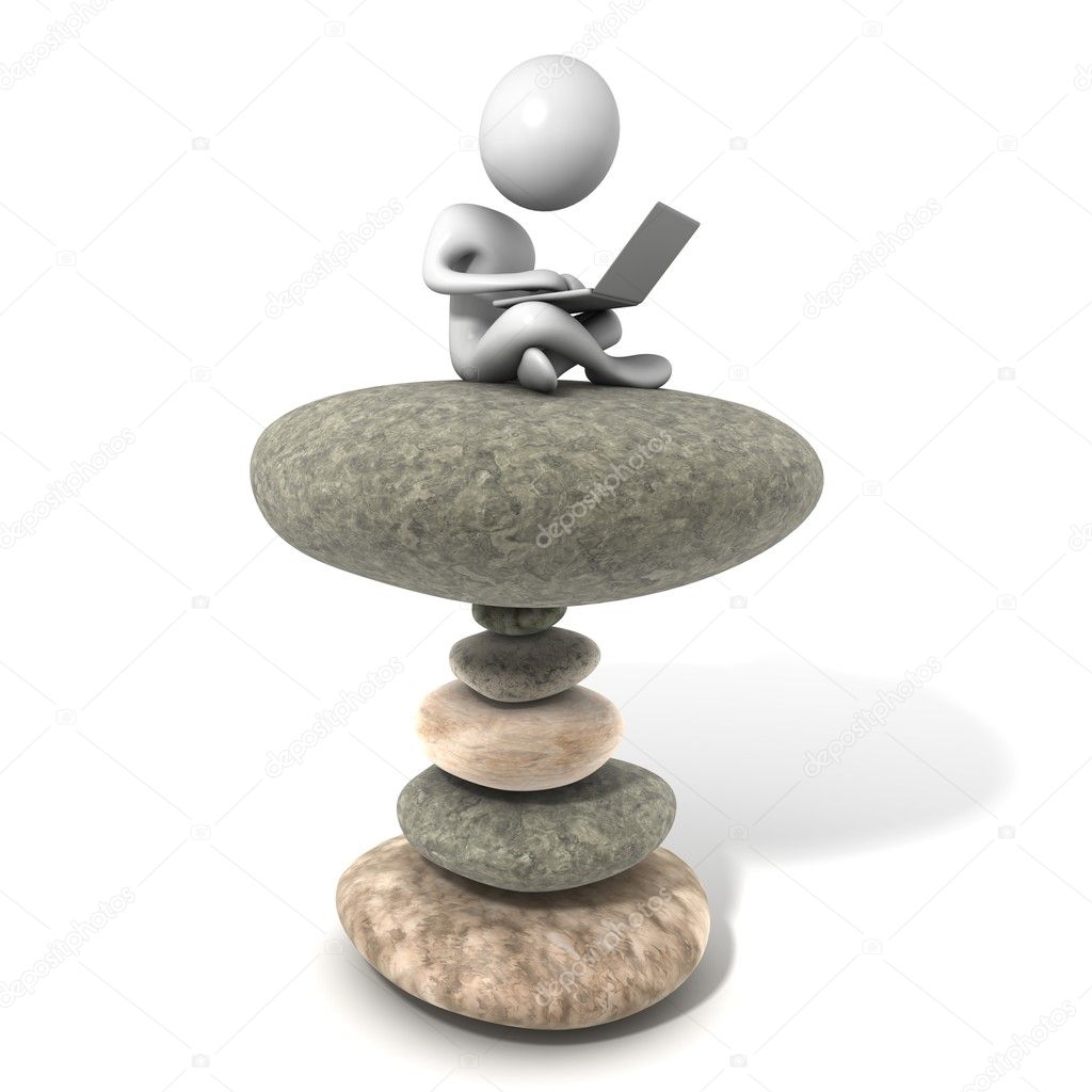 Young man sitting on stack of stones with the Laptop.