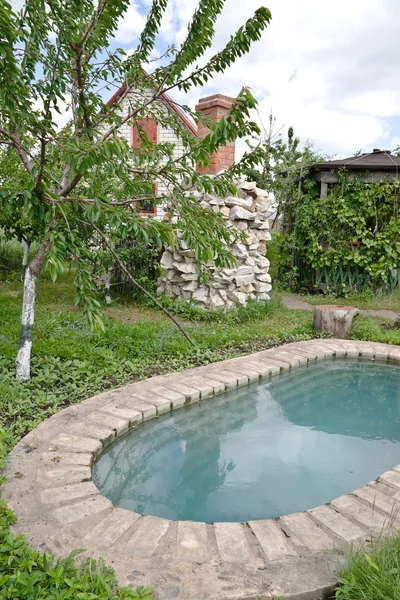 stock image An artificial pond at the country dacha