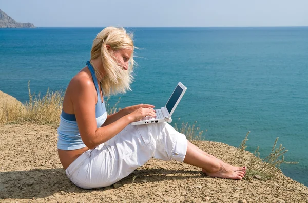 Girl with netbook — Stock Photo, Image