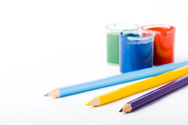 Paint and pencils — Stock Photo, Image
