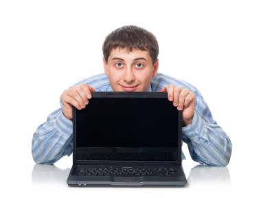 Young adult man behind the laptop clipart