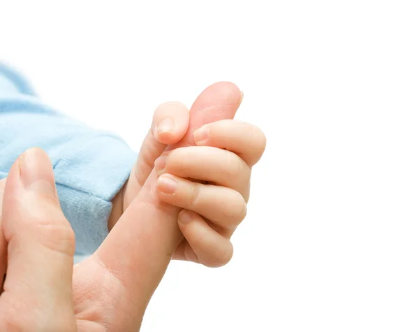 Main bébé tenant doigt mère — Photo