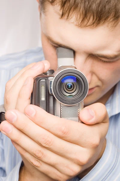 Closeup man portrait with videocamera — Stock Photo, Image