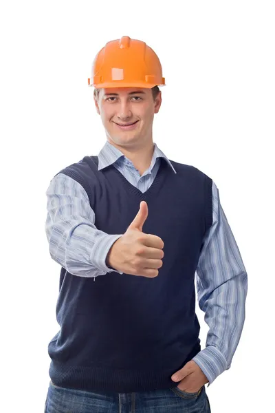 Man in oranje helm goed teken weergegeven: — Stockfoto