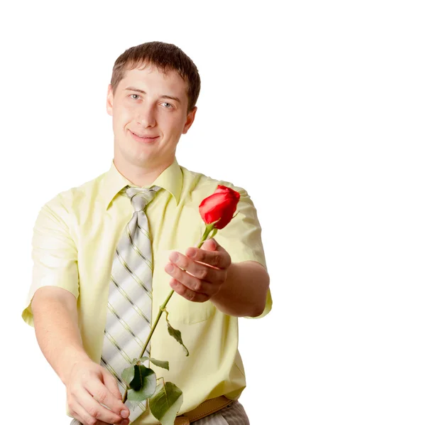 Jonge volwassen man met rode roos — Stockfoto