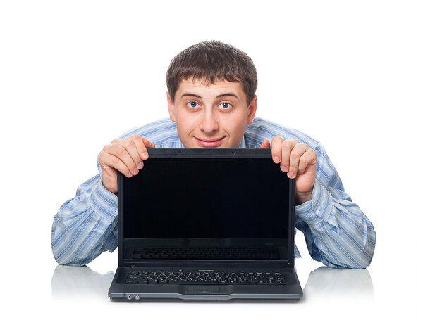 Young adult man behind the laptop