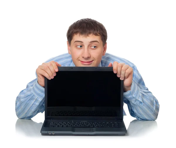 Hombre hábil detrás de la computadora portátil —  Fotos de Stock