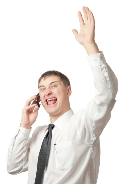 Бизнесмен звонит по телефону и поднимает руку — стоковое фото