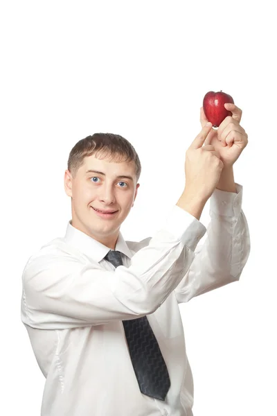 Бизнесмен показывает яблоко — стоковое фото