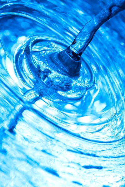 Pouring blue fresh water — Stock Photo, Image