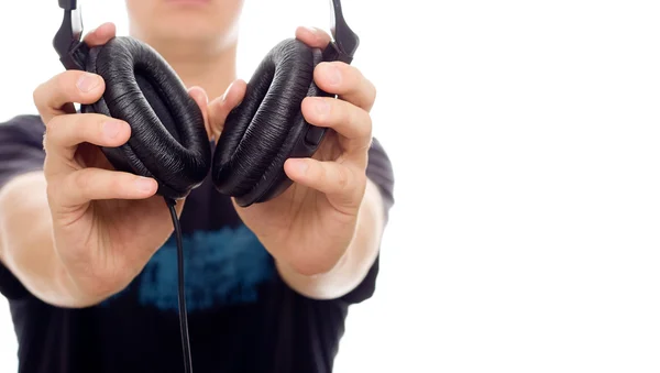 DJ giving headphones Royalty Free Stock Images