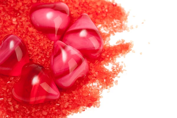 Some red hearts with salt — Stock Photo, Image
