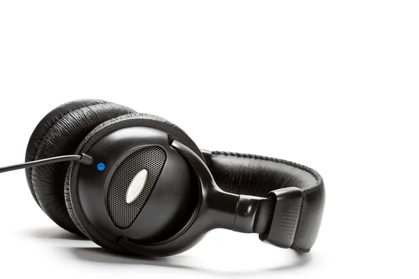 Black isolated headphones — Stock Photo, Image
