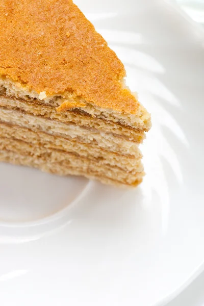 Cake on white plate — Stock Photo, Image
