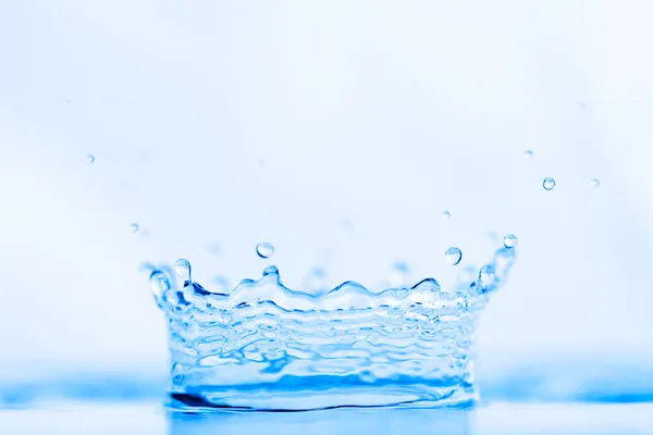 Coroa respingo água azul — Fotografia de Stock