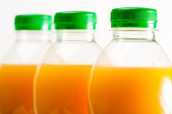 Bottiglie succo d'arancia — Foto Stock