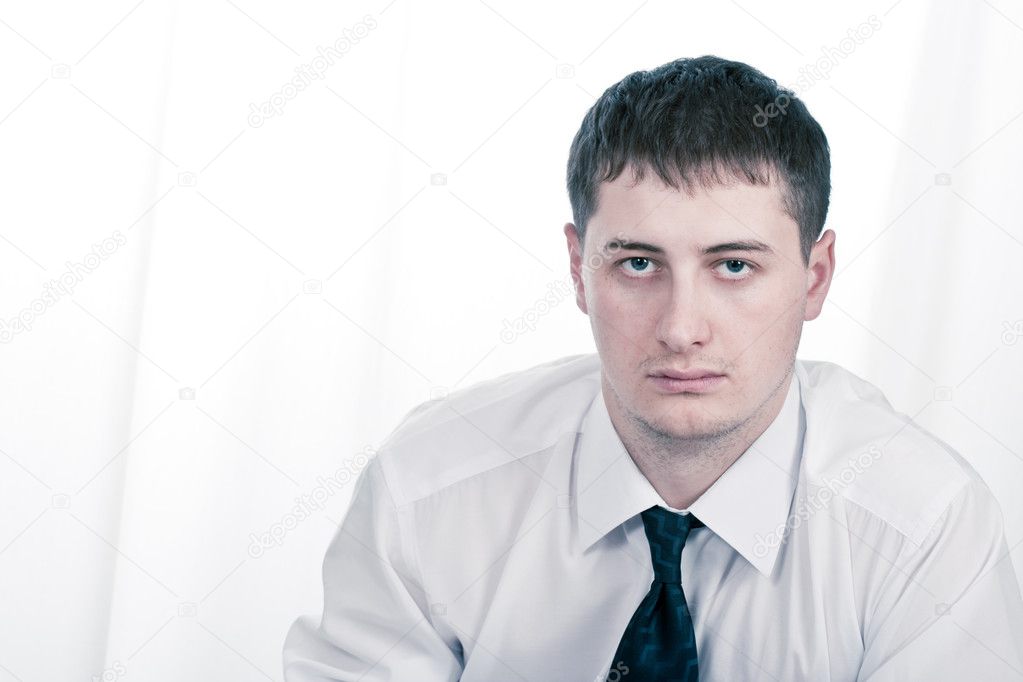 Young adult serious businessman