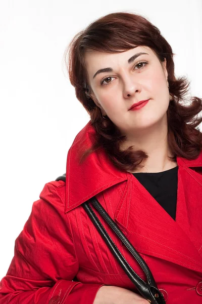 Woman in red coat — Stock Photo, Image