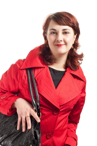 Portret kobiety w czerwonym płaszczu — Zdjęcie stockowe