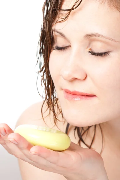 Closeup woman face with soap bar — Stock Photo, Image