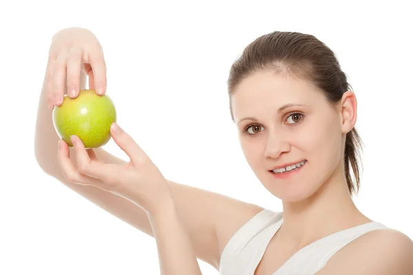 Jovem mulher adulta segurando maçã — Fotografia de Stock