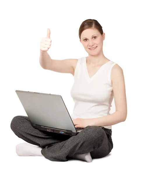 Радостная женщина с ноутбуком — стоковое фото