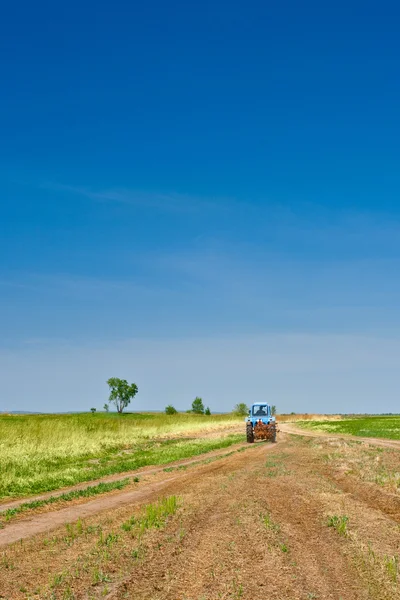 Tractor going to the work — Stock Photo, Image