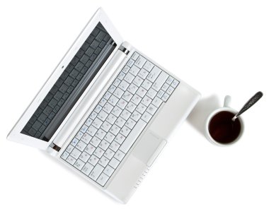 White netbook with coffee top view clipart