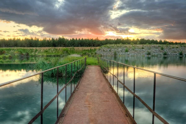 stock image Old rusty bridge under sunset